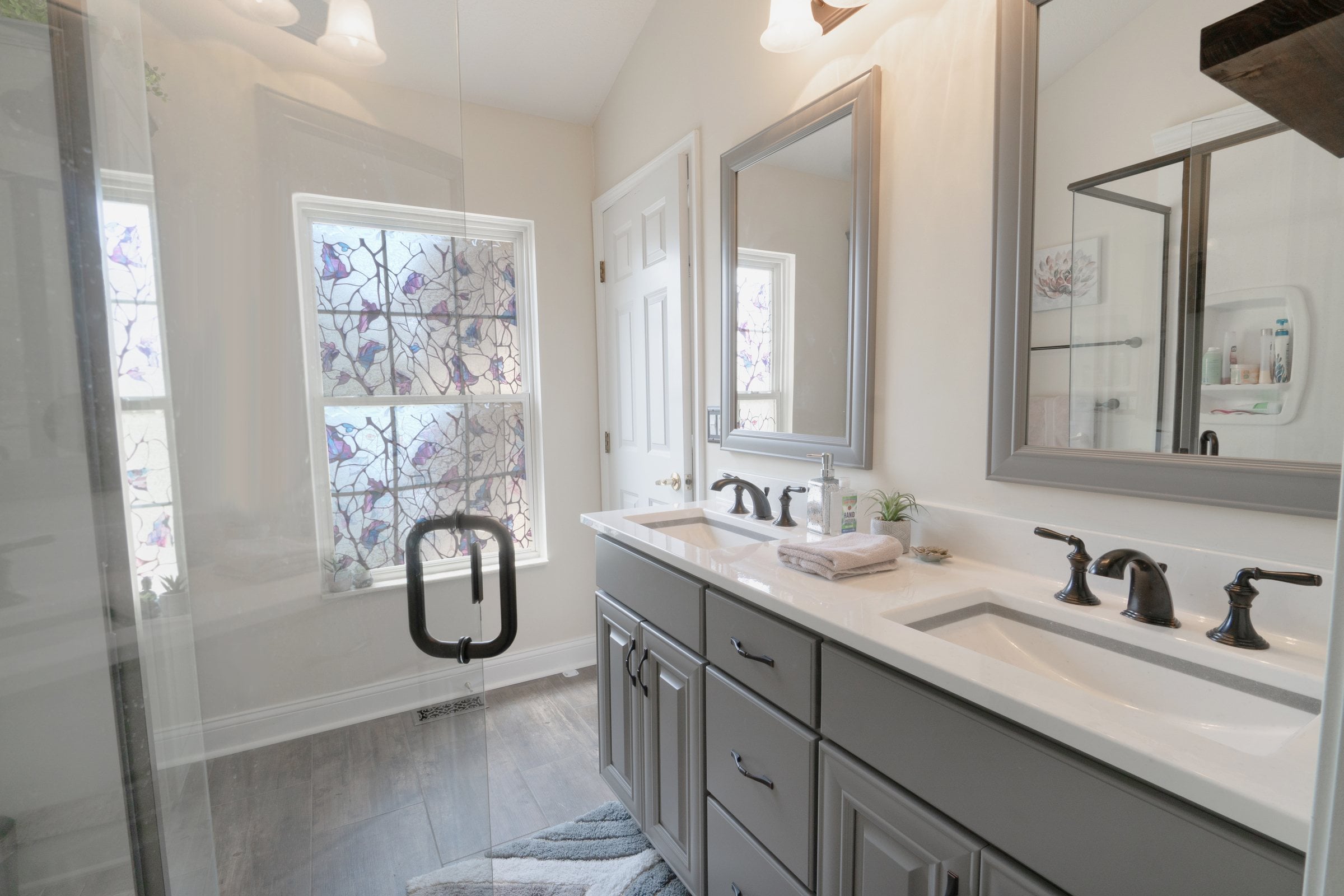 Detail of a tiled shower remodeled by JSB Home Solutions