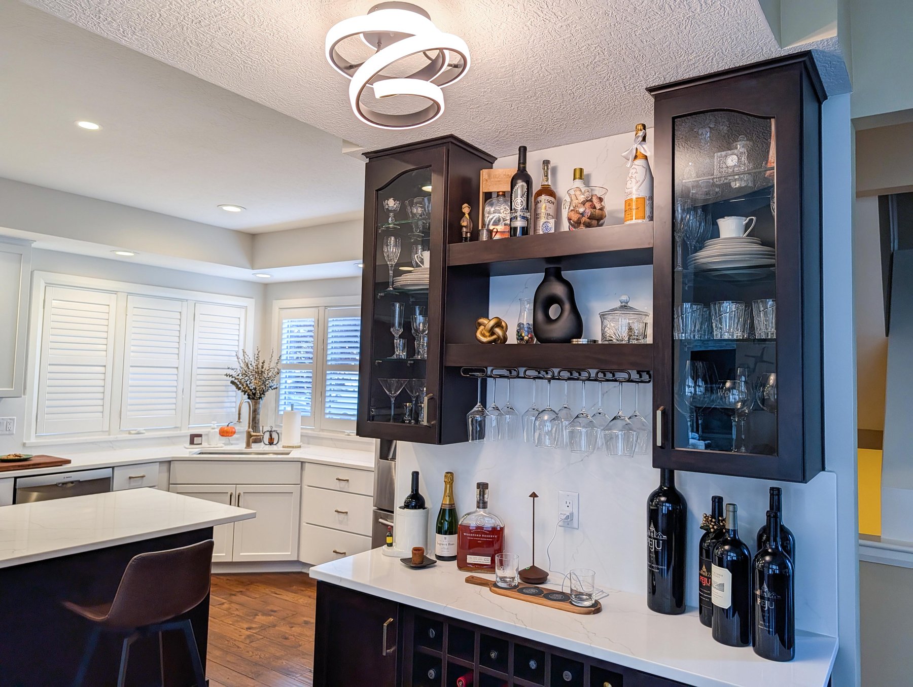 JSB Home Solutions kitchen remodel with shaker cabinetry and a large central island